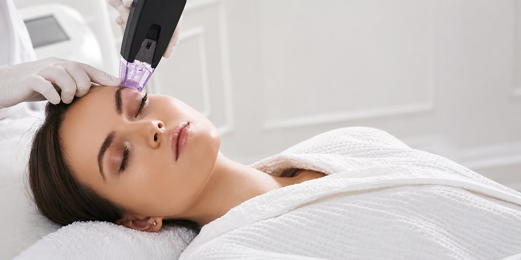 a woman receiving an RF microneedling treatment in Victoria BC